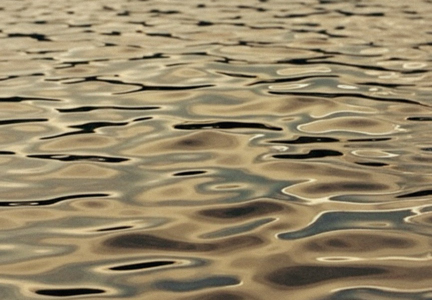 Wavy sand patterns on a beach