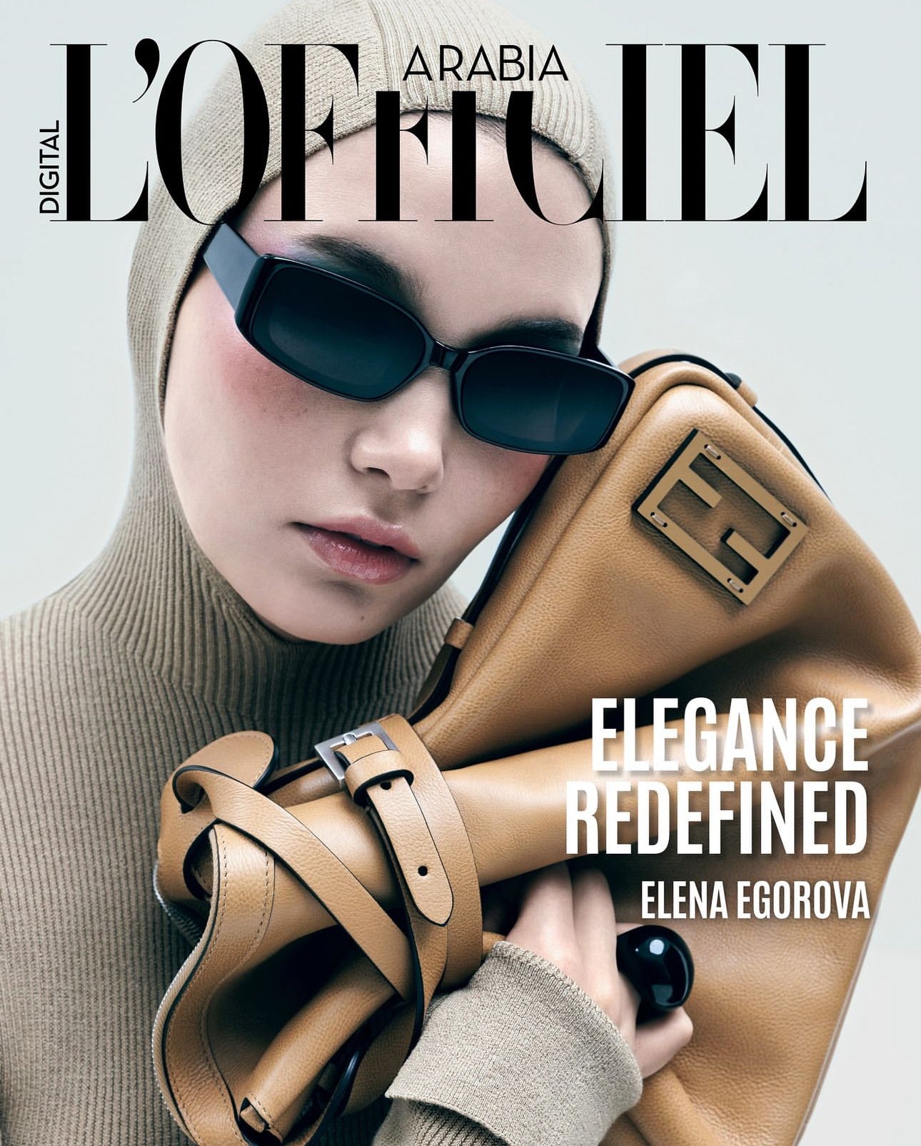 Cover of L’Officiel Arabia featuring a model wearing an Enso Design Lab™ ring, styled by Polina Shabelnikova, embodying the brand’s minimalist and elegant aesthetic.