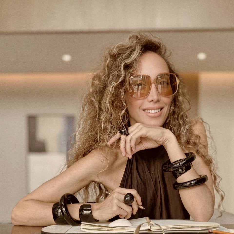 Ani Han, Creative Director of Enso Design Lab, working with design materials and sketches