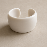 Object 03
Wide cuff bangle in polished white finish