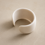 Object 03
Wide cuff bangle in polished white finish