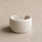 Object 03
Wide cuff bangle in polished white finish