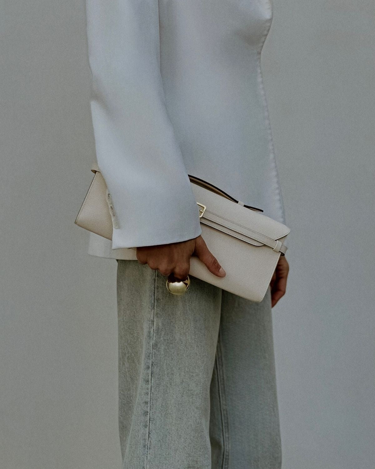 Tori Bag by Enso Design Lab™ in ivory Epsom leather, minimalist design guided by Ani Han, echoing the understated refinement seen in Hermès or The Row.