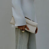 Tori Bag by Enso Design Lab™ in ivory Epsom leather, minimalist design guided by Ani Han, echoing the understated refinement seen in Hermès or The Row.