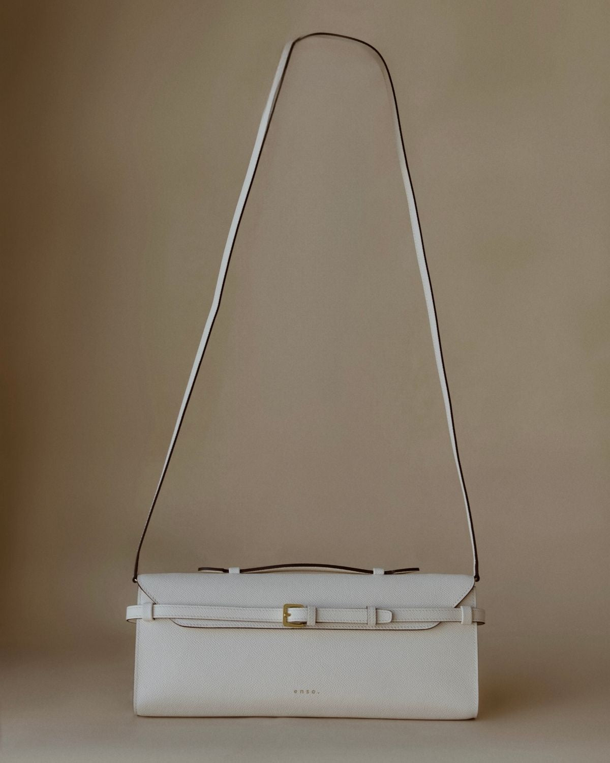 Tori Bag by Enso Design Lab™ in ivory Epsom leather, minimalist design guided by Ani Han, echoing the understated refinement seen in Hermès or The Row.