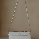 Tori Bag by Enso Design Lab™ in ivory Epsom leather, minimalist design guided by Ani Han, echoing the understated refinement seen in Hermès or The Row.