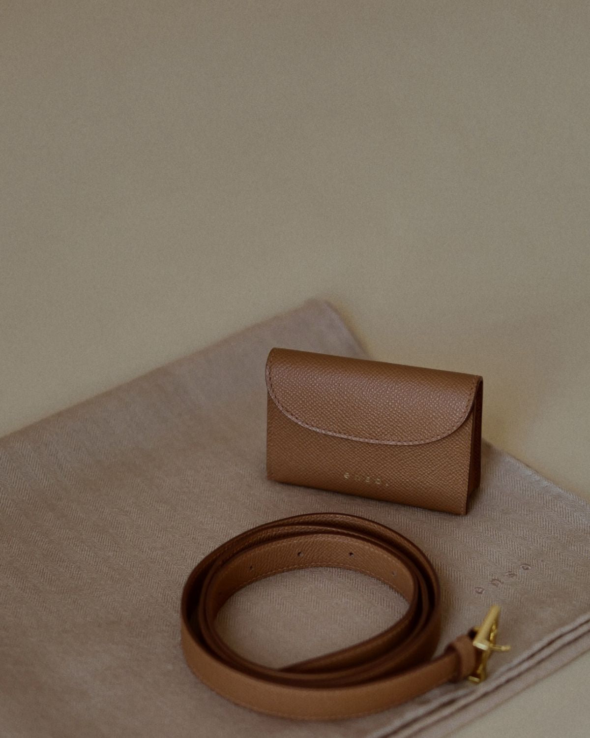 Ava Belt worn as a chic belt bag, versatile design inspired by quiet luxury aesthetics guided by Ani Han.