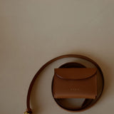 Close-up of Ava Belt’s detachable pouch, reflecting Enso Design Lab™ craftsmanship and a whisper of Bottega-like subtlety.