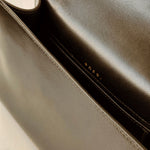 Interior view of the Essence Bag, soft natural leather lining embodying ‘Celebrate Life’ in tactile simplicity.