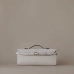 Tori Bag by Enso Design Lab™ in ivory Epsom leather, minimalist design guided by Ani Han, echoing the understated refinement seen in Hermès or The Row.