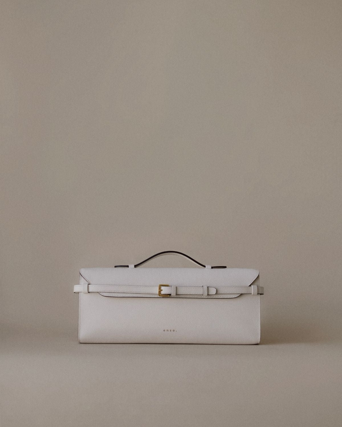 Tori Bag by Enso Design Lab™ in ivory Epsom leather, minimalist design guided by Ani Han, echoing the understated refinement seen in Hermès or The Row.