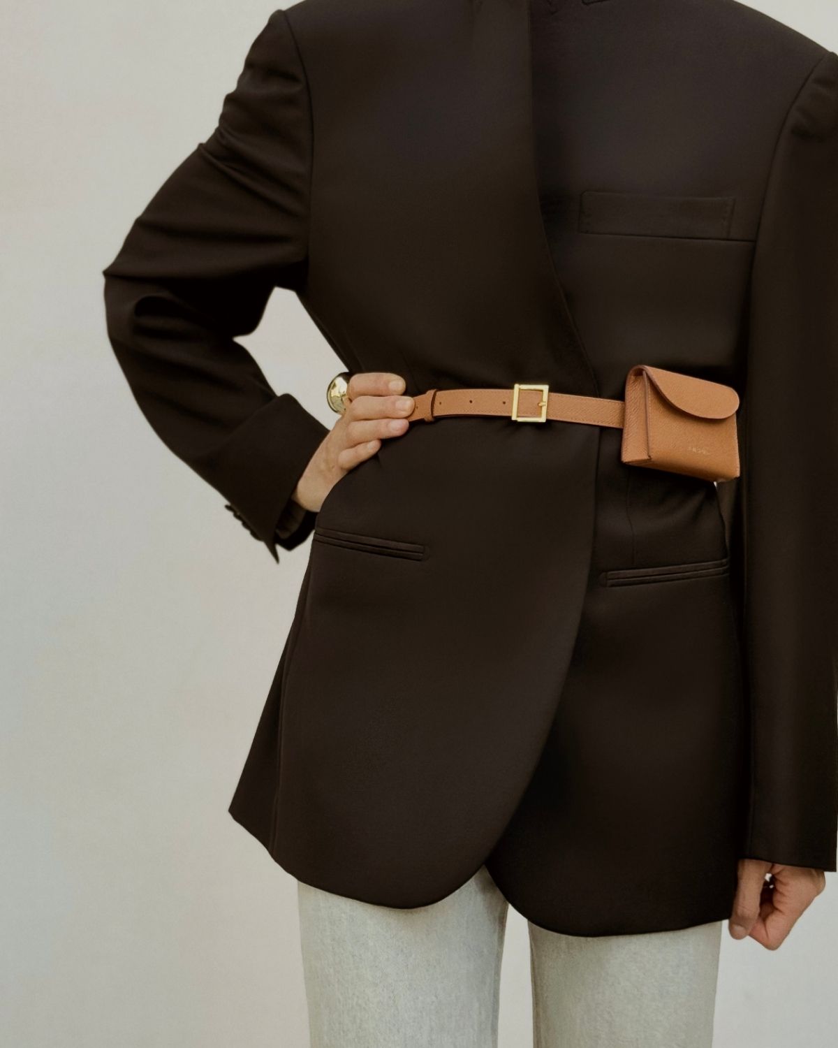 Ava Belt worn as a chic belt bag, versatile design inspired by quiet luxury aesthetics guided by Ani Han.