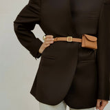 Ava Belt worn as a chic belt bag, versatile design inspired by quiet luxury aesthetics guided by Ani Han.