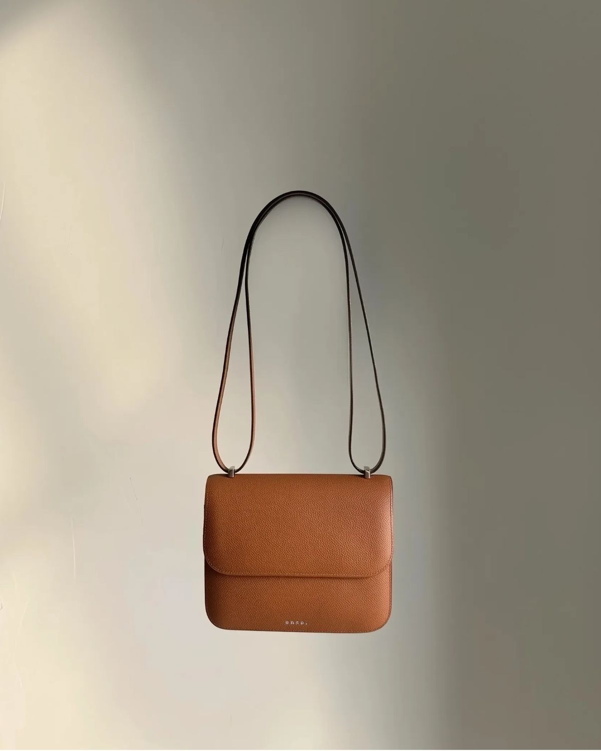 Ava Bag by Enso Design Lab™ in golden brown premium grain leather, quietly echoing Hermès-like refinement under Ani Han’s direction.