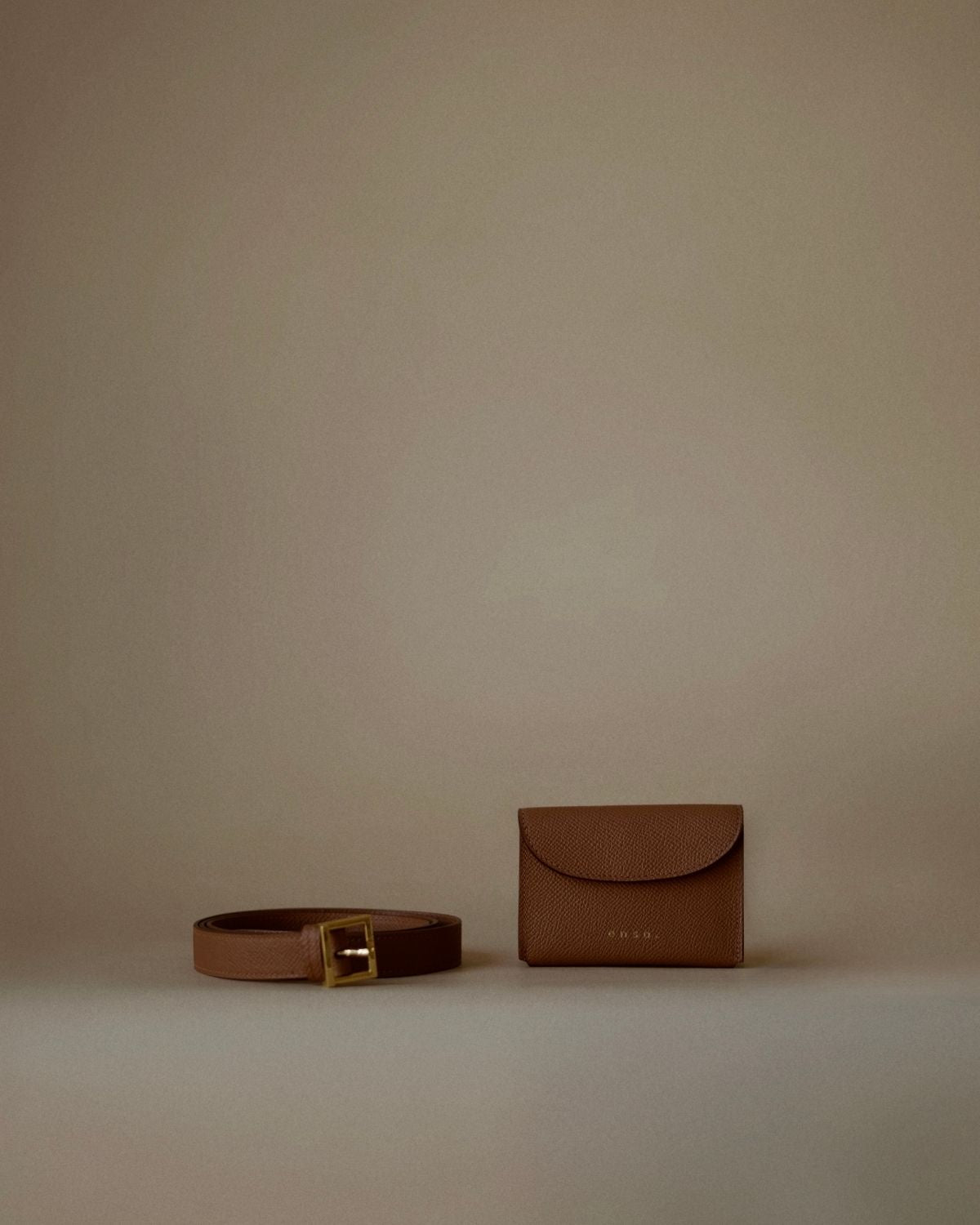 Ava Belt by Enso Design Lab™ in golden brown full-grain leather, channeling a subtle refinement akin to Hermès or The Row.