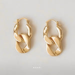 Evolution Earrings by Enso Design Lab™ with 18k gold plating, 27 mm x 17 mm, elegant and lightweight.