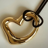 Flow - Heart Necklace by Enso Design Lab™ with 18k gold plating, pendant size 4 cm x 3 cm, sculptural and elegant heart design.