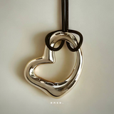 Flow - Heart Necklace by Enso Design Lab™ with premium rhodium plating, pendant size 4 cm x 3 cm, sculptural and elegant heart design.