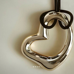 Flow - Heart Necklace by Enso Design Lab™ with premium rhodium plating, pendant size 4 cm x 3 cm, sculptural and elegant heart design.