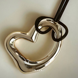 Flow - Heart Necklace by Enso Design Lab™ with premium rhodium plating, pendant size 4 cm x 3 cm, sculptural and elegant heart design.