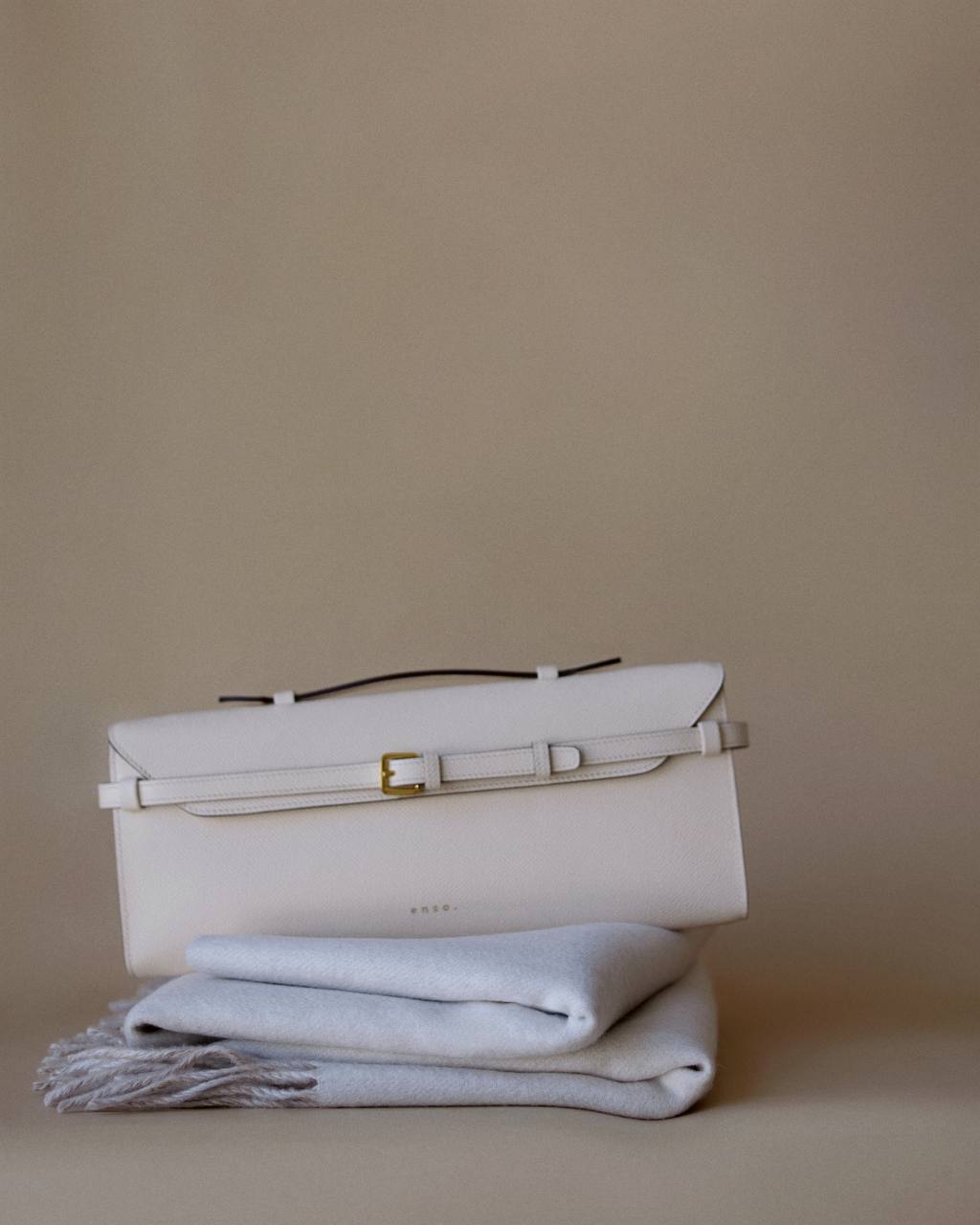 Tori Bag by Enso Design Lab™ in ivory Epsom leather, minimalist design guided by Ani Han, echoing the understated refinement seen in Hermès or The Row.