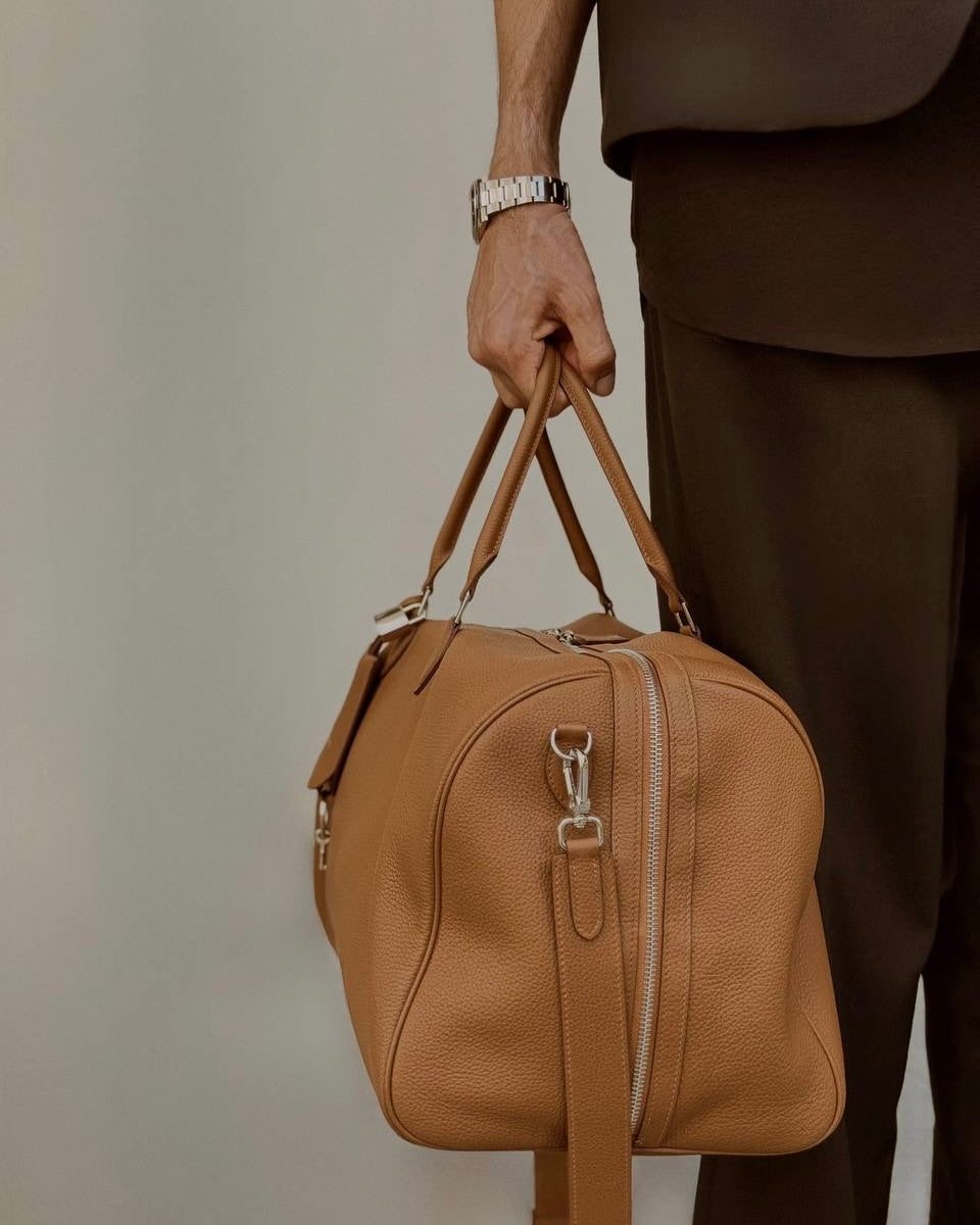 Noa Duffle Bag by Enso Design Lab™—a graceful blend of materials and design elements, subtly hinting at Hermès and Bottega-level luxury, made to ‘Celebrate Life’.