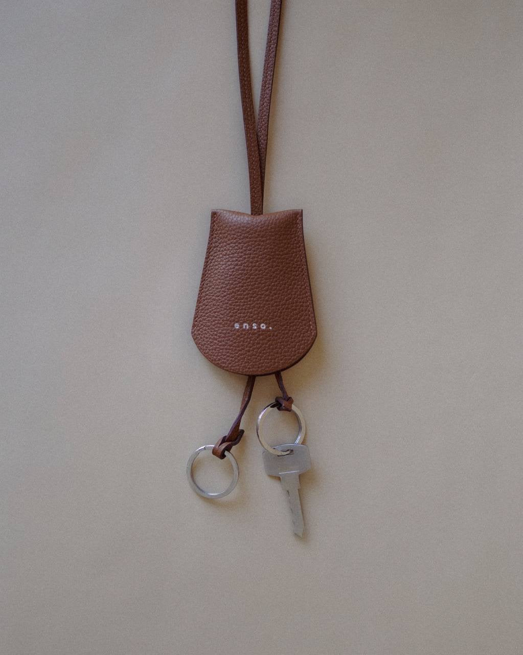 Golden Brown Key Holder Necklace by Enso Design Lab™, combining functionality and minimalist elegance.