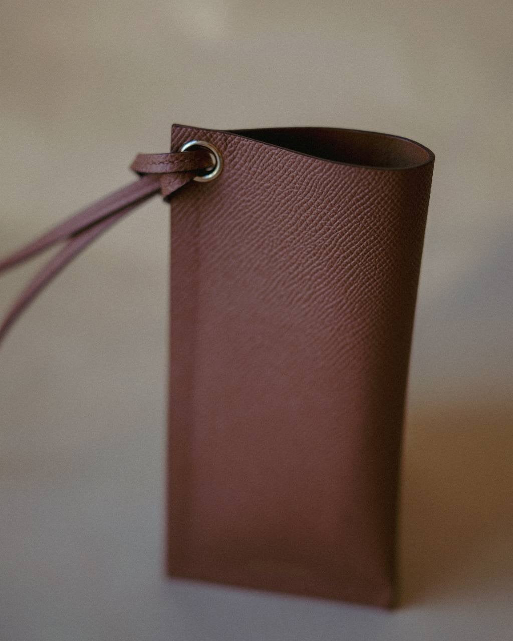 Top view of the Leather Sunglasses Holder, emphasizing its smooth interior lining and refined stitching.