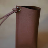 Top view of the Leather Sunglasses Holder, emphasizing its smooth interior lining and refined stitching.