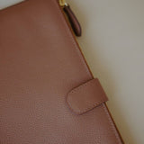 Close-up of the Leather Organizer Case, highlighting the pebbled leather texture and durable zip closure.