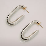 Embrace Earrings by Enso Design Lab™ with rhodium plating and 18k gold tips, 41.6 mm long, stylish and lightweight.