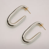 Embrace Earrings by Enso Design Lab™ with rhodium plating and 18k gold tips, 41.6 mm long, stylish and lightweight.