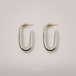 Embrace Earrings by Enso Design Lab™ with rhodium plating and 18k gold tips, 41.6 mm long, stylish and lightweight.