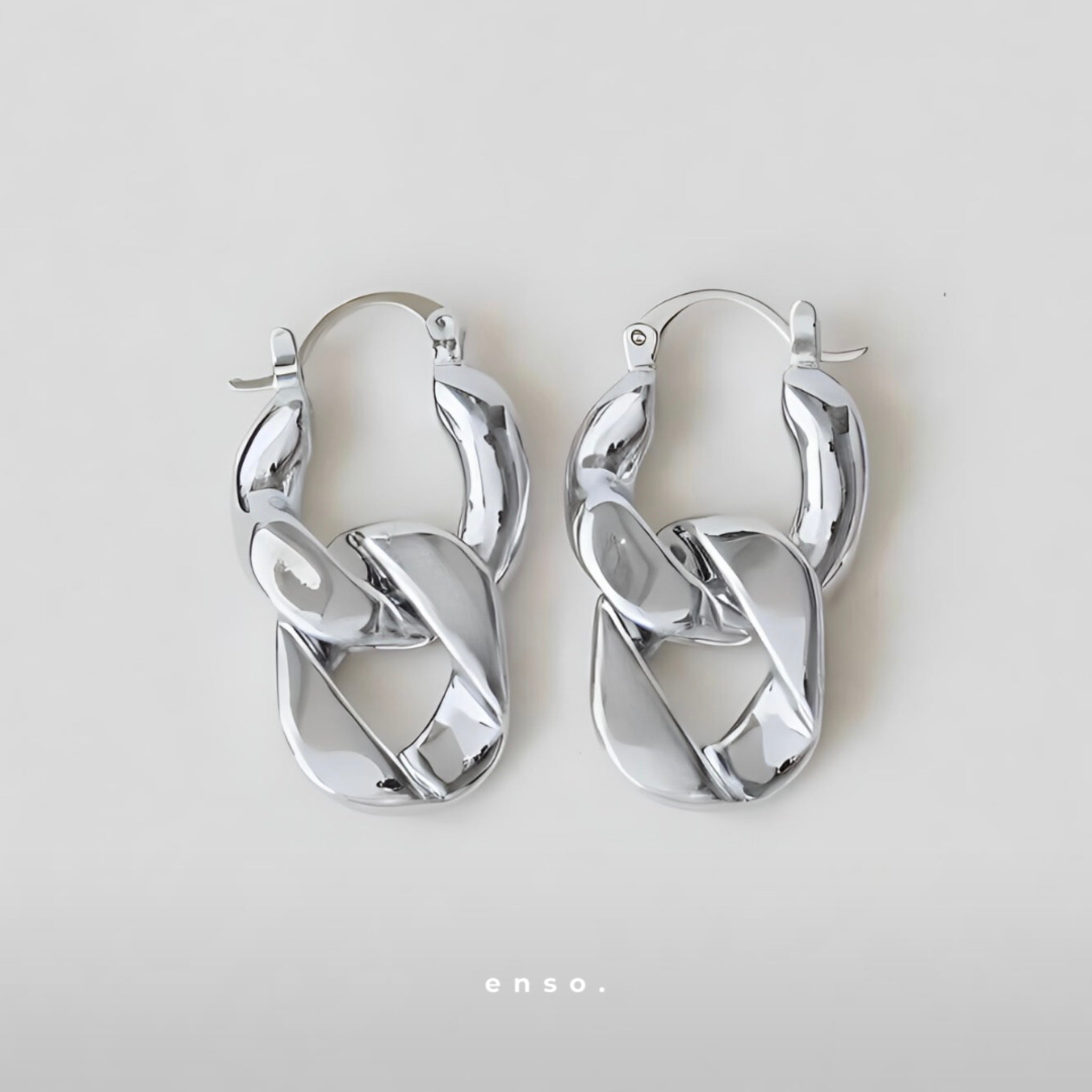 Evolution Earrings by Enso Design Lab™ with premium rhodium plating, 27 mm x 17 mm, elegant and lightweight.