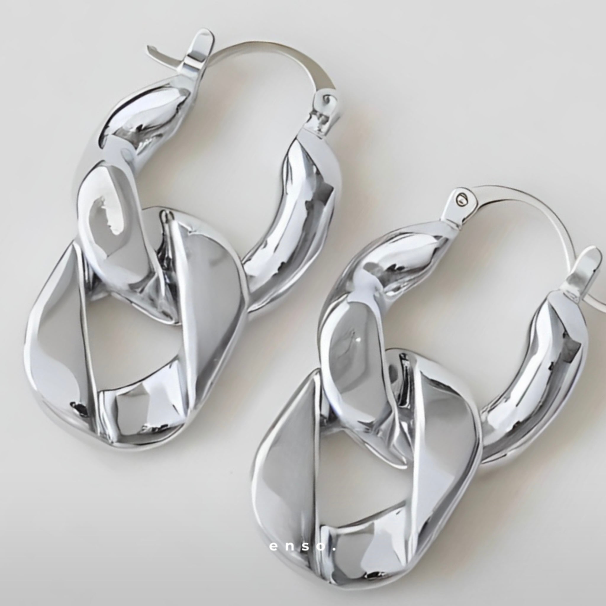 Evolution Earrings by Enso Design Lab™ with premium rhodium plating, 27 mm x 17 mm, elegant and lightweight.