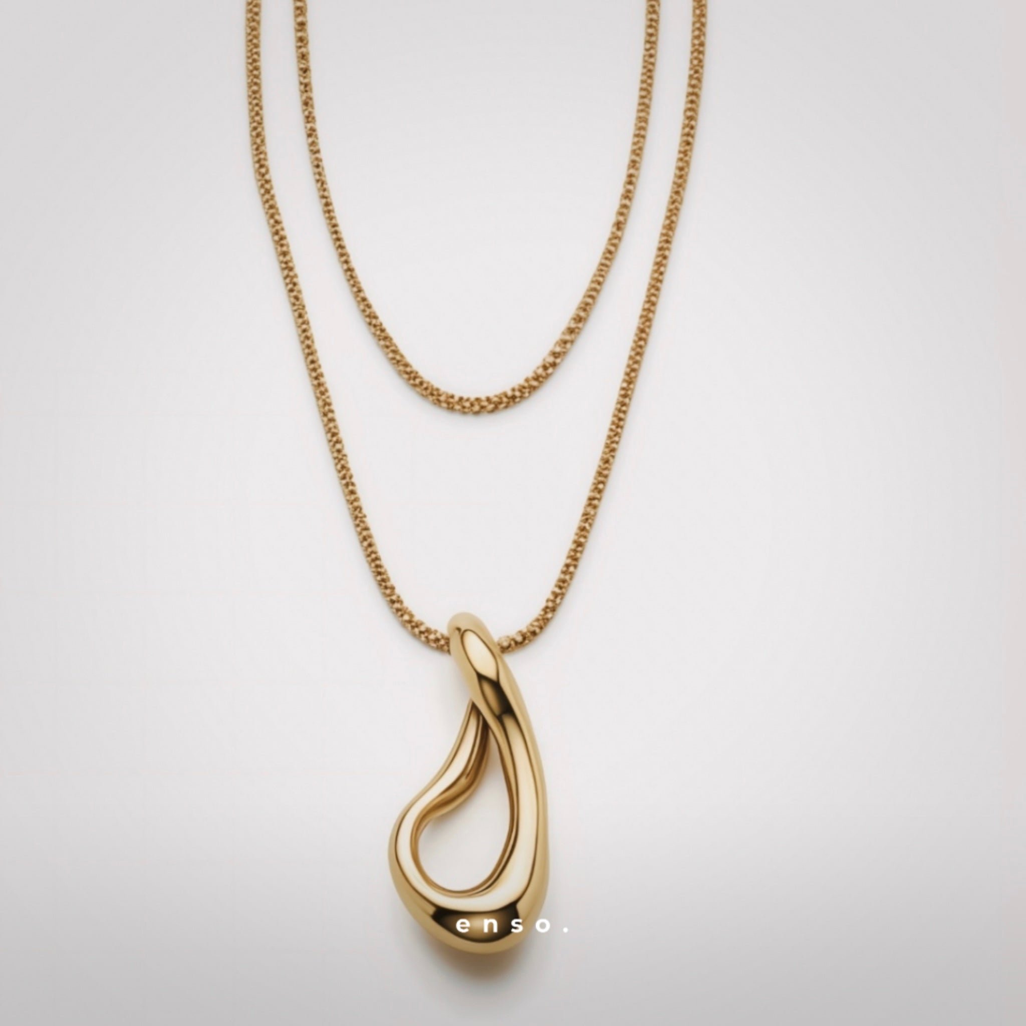 Flow - Cascade Necklace by Enso Design Lab™ with 18k gold plating, pendant size 1.9 cm x 1.3 cm, stylish and lightweight.