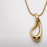 Flow - Cascade Necklace by Enso Design Lab™ with 18k gold plating, pendant size 1.9 cm x 1.3 cm, stylish and lightweight.