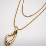 Flow - Cascade Necklace by Enso Design Lab™ with 18k gold plating, pendant size 1.9 cm x 1.3 cm, stylish and lightweight.