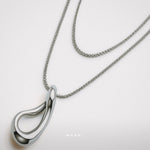 Flow - Cascade Necklace by Enso Design Lab™ with premium rhodium plating, pendant size 1.9 cm x 1.3 cm, stylish and lightweight.