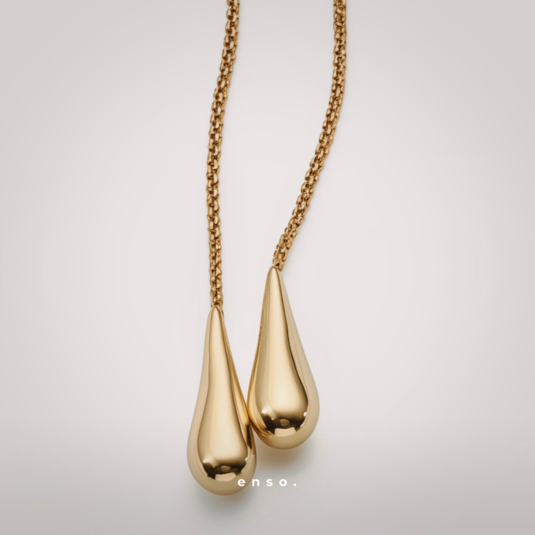 Drops of Light Necklace by Enso Design Lab™ in 18k gold plating, fluid lines, and seamless 180 cm design.