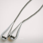 Drops of Light Necklace by Enso Design Lab™ in premium rhodium plating, fluid lines, and seamless 180 cm design.