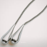 Drops of Light Necklace by Enso Design Lab™ in premium rhodium plating, fluid lines, and seamless 180 cm design.