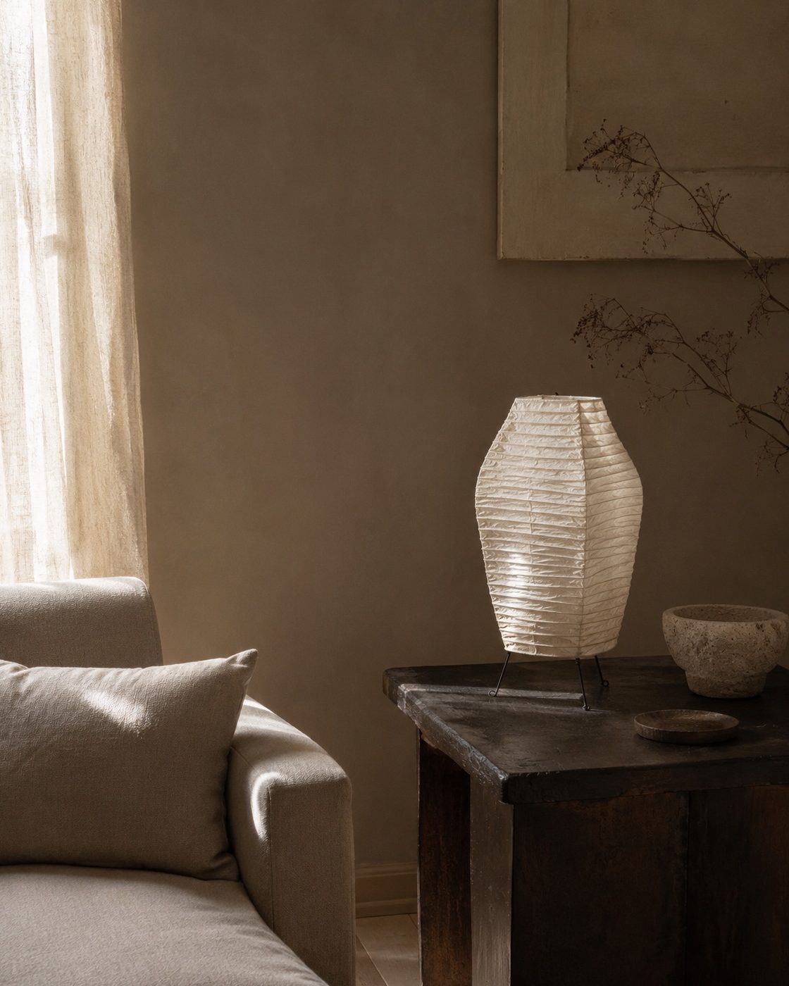 Paper lamp and natural materials under controlled light