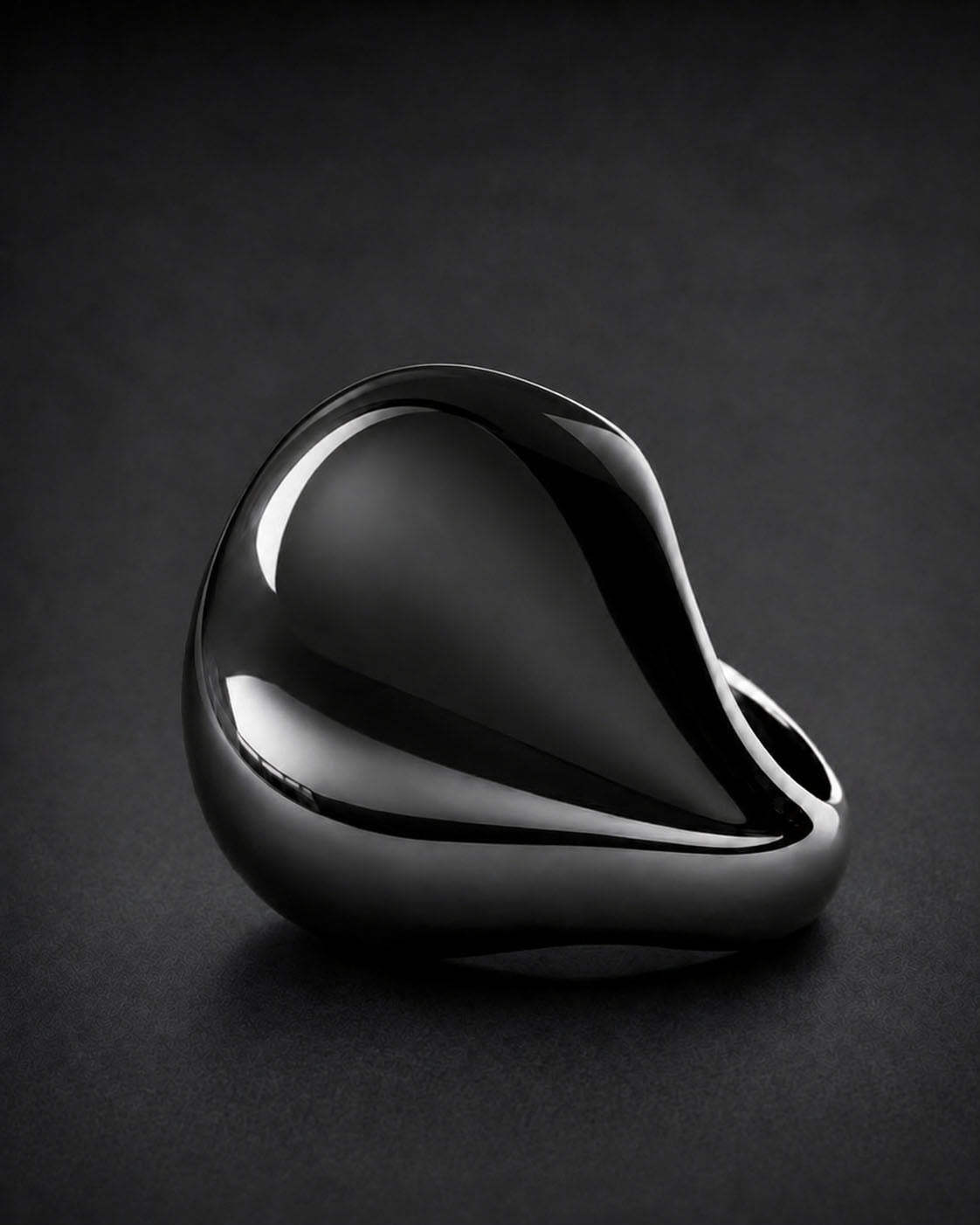 CONTAIN ring in obsidian mirror — hero view